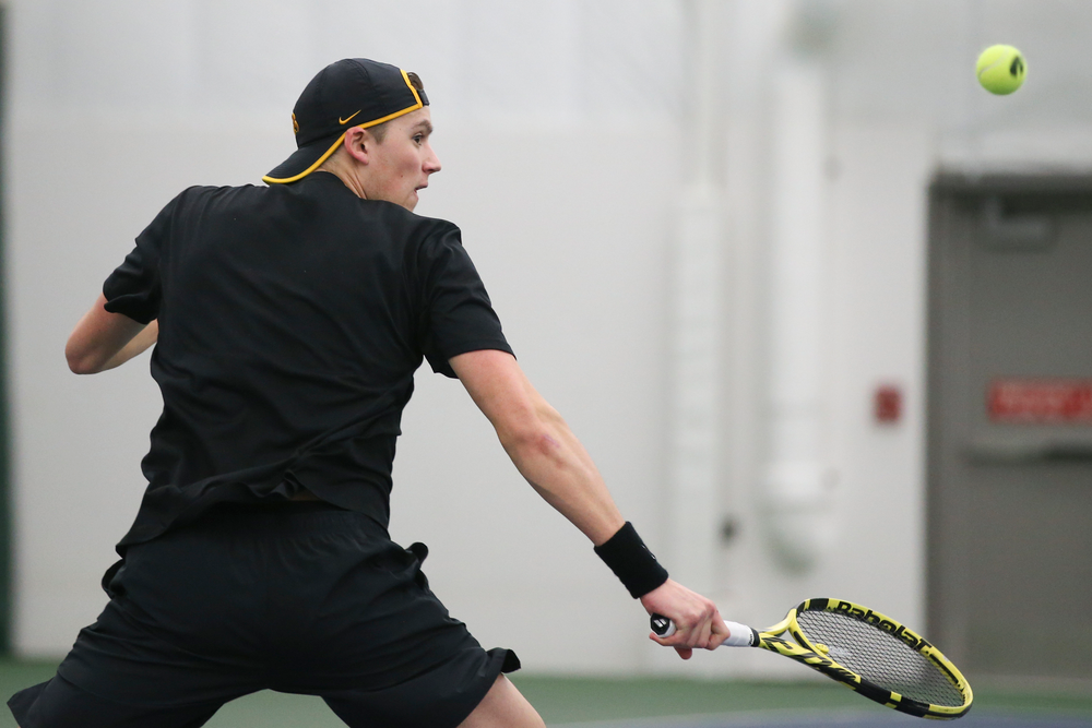 Iowa’s Joe Tyler returns a hit during the Iowa men’s tennis meet vs VCU on Saturday, February 29, 2020 at the Hawkeye Tennis and Recreation Complex. (Lily Smith/hawkeyesports.com)