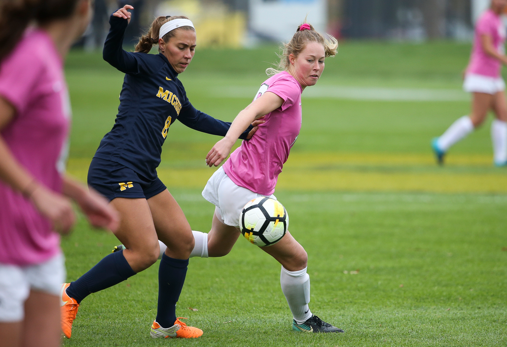 Iowa Hawkeyes midfielder Natalie Winters (10) fights for possession during a game against Michigan at the Iowa Soccer Complex on October 14, 2018. (Tork Mason/hawkeyesports.com)