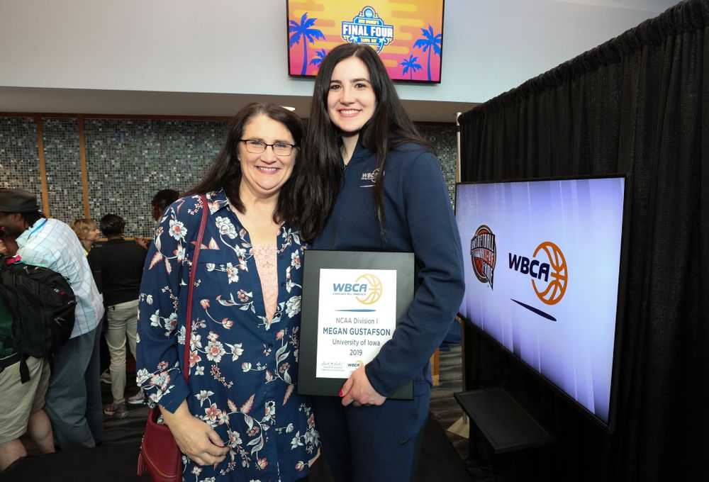 Iowa Hawkeyes forward Megan Gustafson (10) and her mother Eva Wednesday, April 4, 2018 at Amalie Arena in Tampa, FL. (Brian Ray/hawkeyesports.com)