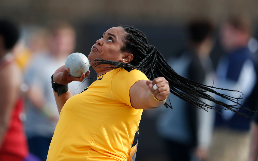 Iowa's Iowa's Laulauga Tausaga competes in the shot put during the 2018 MUSCO Twilight Invitational Thursday, April 12, 2018 at the Cretzm