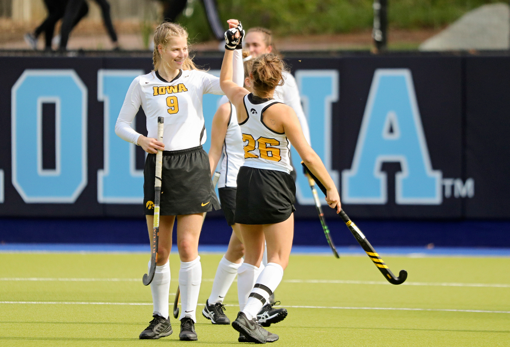 Iowa’s Sofie Stribos (9) and Maddy Murphy (26) high-five before their NCAA Tournament Second Round match against North Carolina at Karen Shelton Stadium in Chapel Hill, N.C. on Sunday, Nov 17, 2019. (Stephen Mally/hawkeyesports.com)
