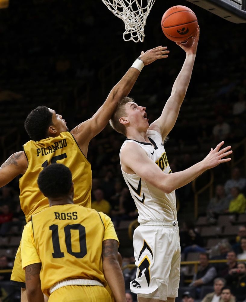 Iowa Hawkeyes forward Michael Baer (0) goes up for a layup during a game against Alabama State at Carver-Hawkeye Arena on November 21, 2018. (Tork Mason/hawkeyesports.com)