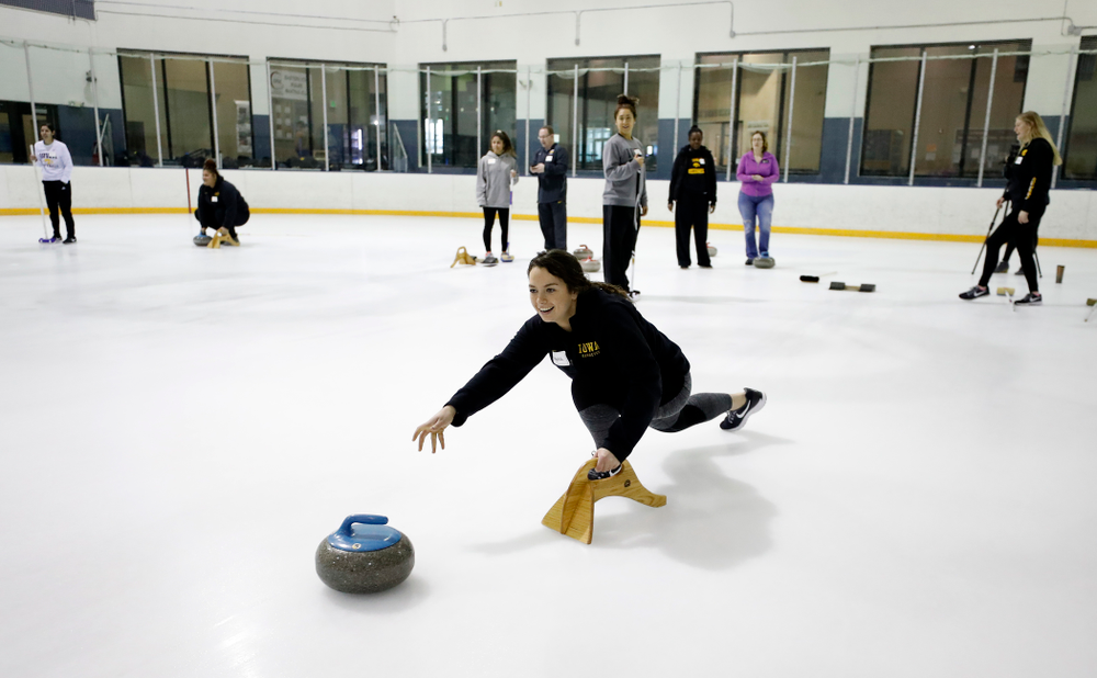 Members of the Iowa Softball team learn the sport of curling as part of a team building event Wednesday, January 10, 2018 at the Cedar Rapids Ice Arena. (Brian Ray/hawkeyesports.com)