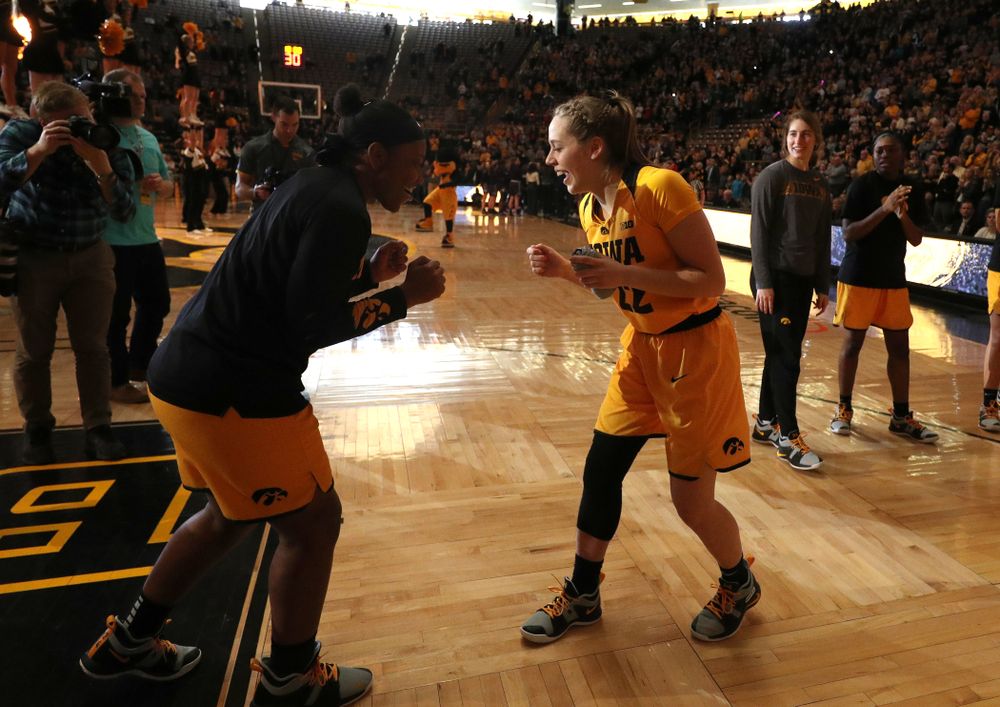 Iowa Hawkeyes guard Kathleen Doyle (22) and guard Zion Sanders (24) against the Northwestern Wildcats Sunday, March 3, 2019 at Carver-Hawkeye Arena. (Brian Ray/hawkeyesports.com)