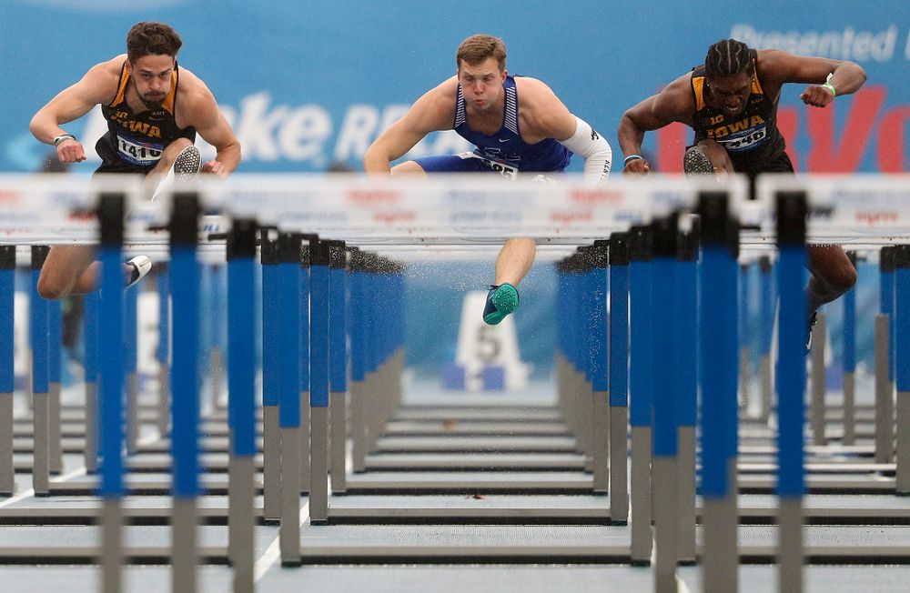 Iowa's Josh Braverman (left) and Anthony Williams (right) run the men's 110 meter hurdles event during the third day of the Drake Relays at Drake Stadium in Des Moines on Saturday, Apr. 27, 2019. (Stephen Mally/hawkeyesports.com)