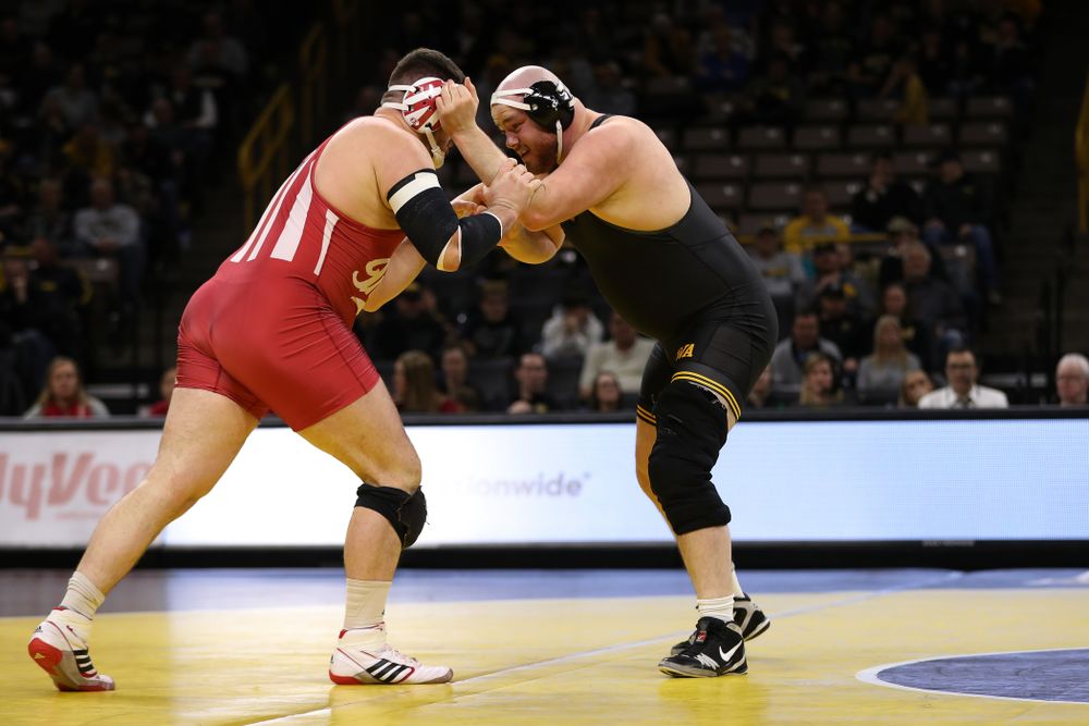 Iowa's Sam Stoll wrestles Indiana's Fletcher Miller at heavyweight Friday, February 15, 2019 at Carver-Hawkeye Arena. (Brian Ray/hawkeyesports.com)