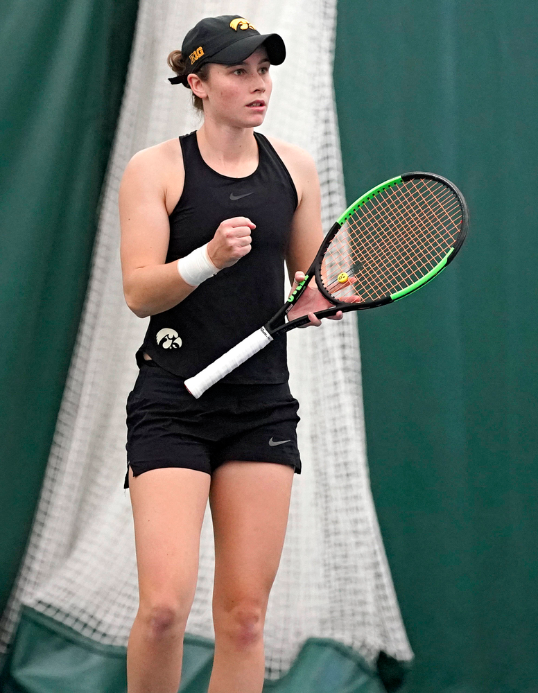 Iowa's Elise van Heuvelen Treadwell pumps her fist as she celebrates during their doubles match against Indiana at the Hawkeye Tennis and Recreation Complex in Iowa City on Sunday, Mar. 31, 2019. (Stephen Mally/hawkeyesports.com)