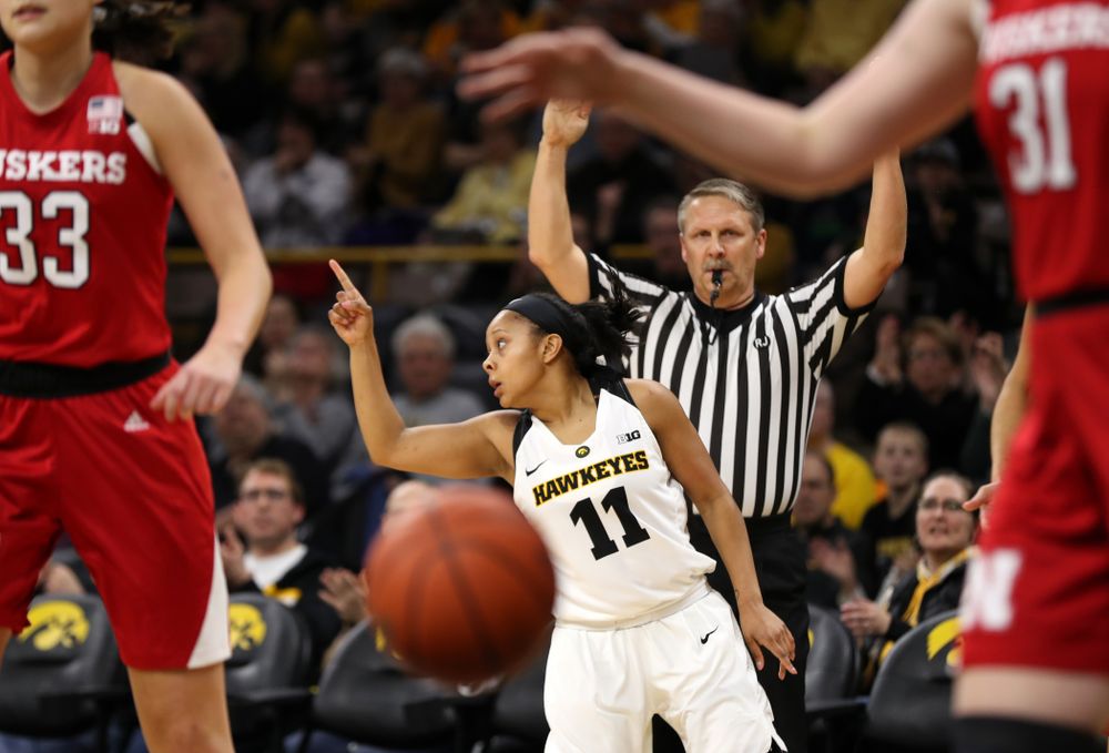 Iowa Hawkeyes guard Tania Davis (11) celebrates after knocking down a three point basket against the Nebraska Cornhuskers Thursday, January 3, 2019 at Carver-Hawkeye Arena. (Brian Ray/hawkeyesports.com)