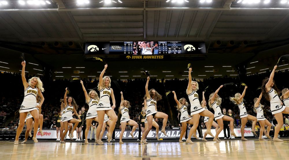 The Iowa Cheerleaders and Dance Team perform on senior night at half-time of the Iowa Hawkeyes game against the Purdue Boilermakers Tuesday, March 3, 2020 at Carver-Hawkeye Arena. (Brian Ray/hawkeyesports.com)