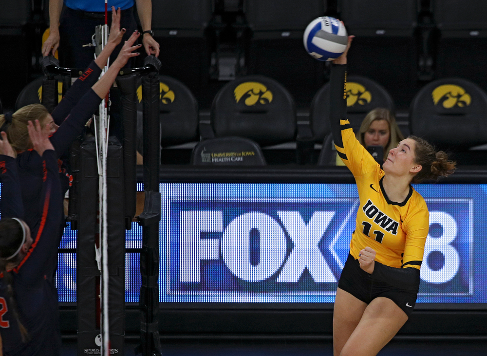 Iowa’s Blythe Rients (11) gets a kill during the second set of their match against Illinois at Carver-Hawkeye Arena in Iowa City on Wednesday, Nov 6, 2019. (Stephen Mally/hawkeyesports.com)