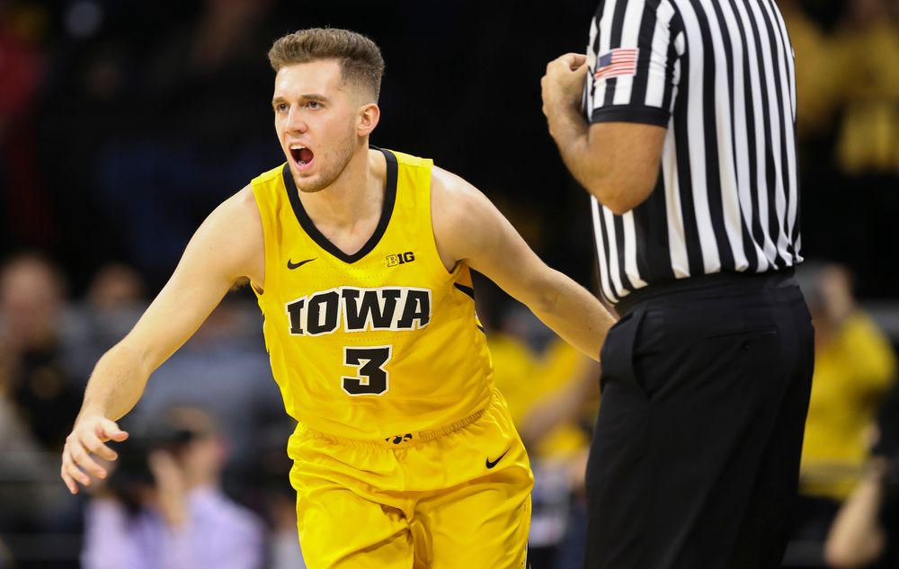 Iowa Hawkeyes guard Jordan Bohannon (3) reacts after hitting a 3-pointer against Wisconsin on November 30, 2018 at Carver-Hawkeye Arena. (Tork Mason/hawkeyesports.com)