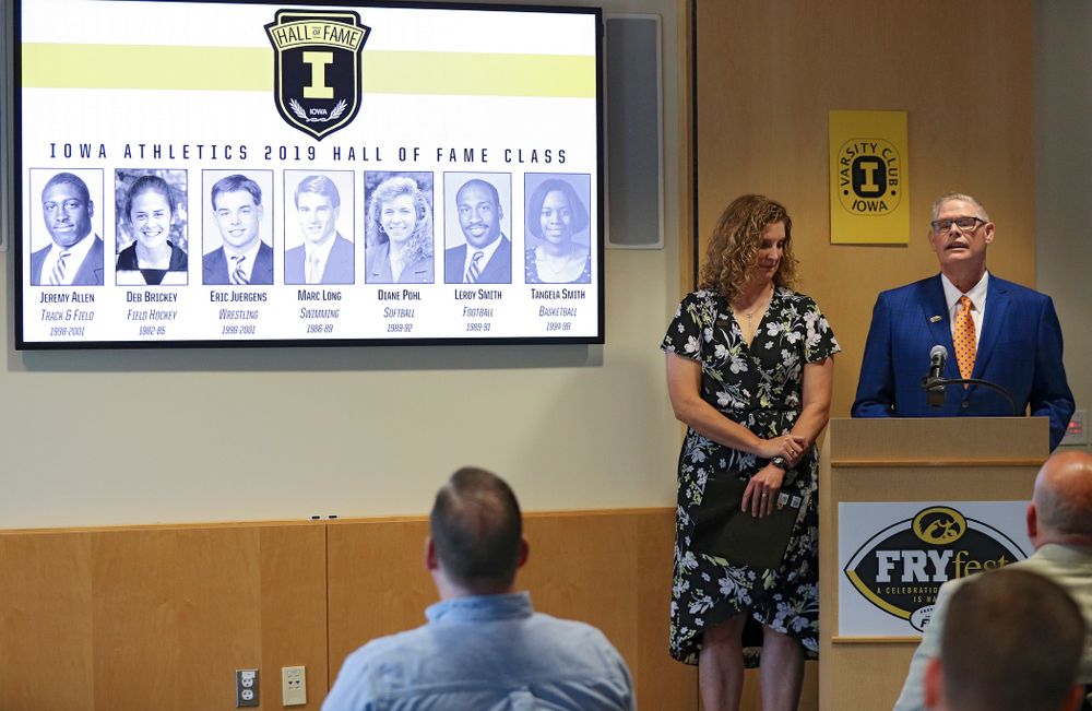 Barb Randall (from left), Iowa Varsity Club Co-Chair, and Lon Olejniczak, Iowa Varsity Club Co-Chair, announce the 2019 Iowa Athletics Hall of Fame members in the Varsity Club Room at the University of Iowa Athletics Hall of Fame in Iowa City on Tuesday, Jun 11, 2019. (Stephen Mally/hawkeyesports.com)