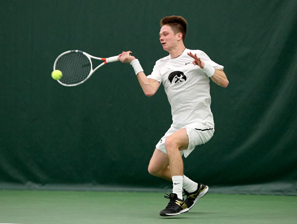 Iowa’s Jason Kerst returns a shot during his singles match at the Hawkeye Tennis and Recreation Complex in Iowa City on Sunday, February 16, 2020. (Stephen Mally/hawkeyesports.com)