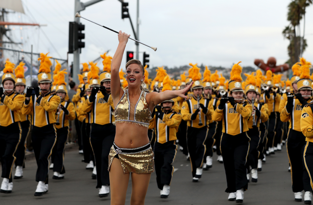 The Hawkeye Marching Band and the Iowa Spirit Squad march in the Holiday Bowl Parade Thursday, December 26, 2019 in San Diego. (Brian Ray/hawkeyesports.com)