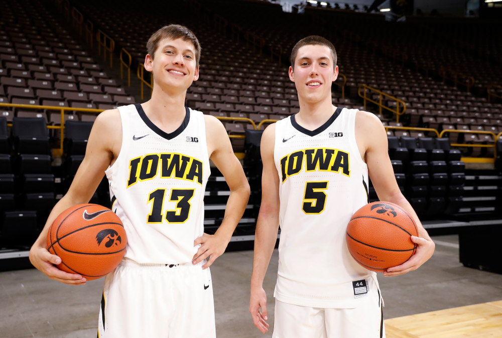 Iowa Hawkeyes guard Austin Ash (13) and guard CJ Fredrick (5) during the team's annual media day Monday, October 8, 2018 at Carver-Hawkeye Arena. (Brian Ray/hawkeyesports.com)