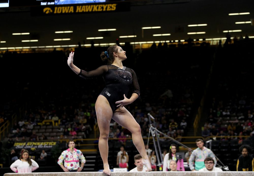 Iowa’s Dani Castillo competes on the beam against Michigan Friday, February 14, 2020 at Carver-Hawkeye Arena. (Brian Ray/hawkeyesports.com)