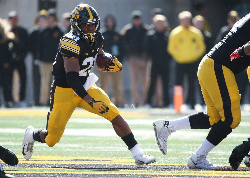 Iowa Hawkeyes running back Ivory Kelly-Martin (21) runs the ball during a game against Maryland at Kinnick Stadium on October 20, 2018. (Tork Mason/hawkeyesports.com)