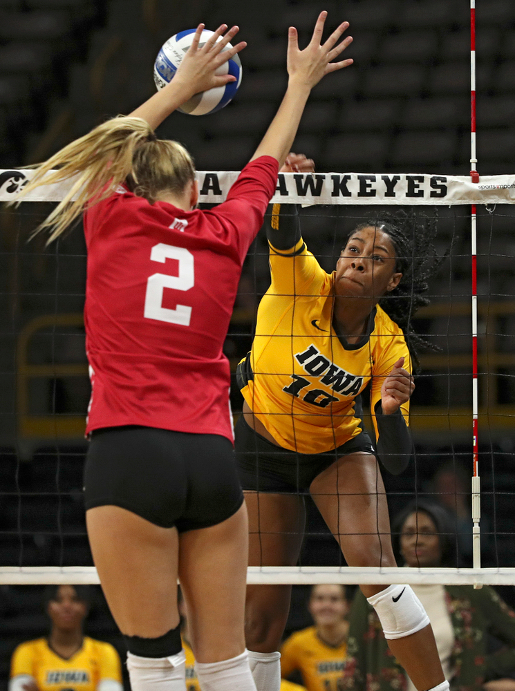 Iowa’s Griere Hughes (10) gets a kill during their match at Carver-Hawkeye Arena in Iowa City on Sunday, Oct 20, 2019. (Stephen Mally/hawkeyesports.com)