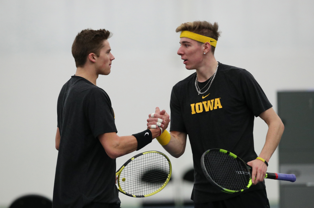 Iowa's Nikita Snezhko and Joe Tyler play a doubles match against UMKC Friday, February 15, 2019 at the Hawkeye Tennis and Recreation Complex. (Brian Ray/hawkeyesports.com)