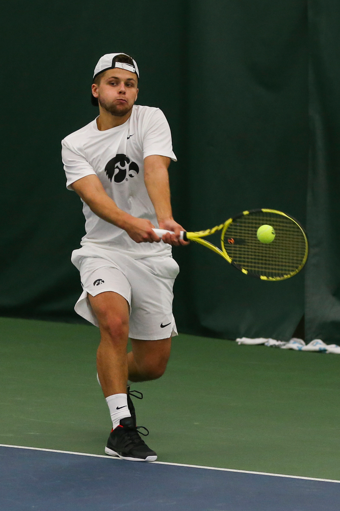Iowa’s Will Davies hits a forehand during the Iowa men’s tennis match vs Western Michigan on Saturday, January 18, 2020 at the Hawkeye Tennis and Recreation Complex. (Lily Smith/hawkeyesports.com)