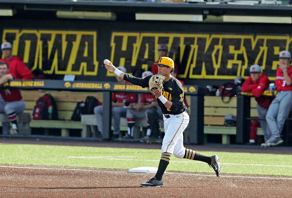 Iowa Hawkeyes third baseman Matthew Sosa (31) throws to second base as they turn a double play during the eighth inning of their game against Rutgers at Duane Banks Field in Iowa City on Saturday, Apr. 6, 2019. (Stephen Mally/hawkeyesports.com)