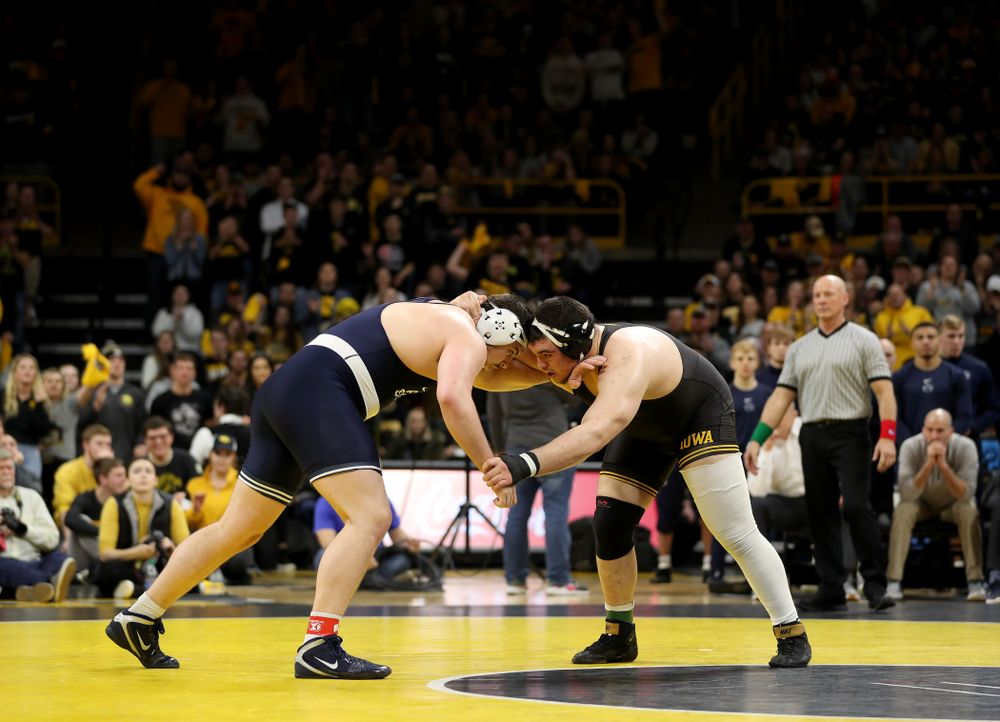 Iowa’s Tony Cassioppi wrestles Penn State’s Seth Nevills at heavyweight Friday, January 31, 2020 at Carver-Hawkeye Arena. Cassioppi won the match 6-0. (Brian Ray/hawkeyesports.com)
