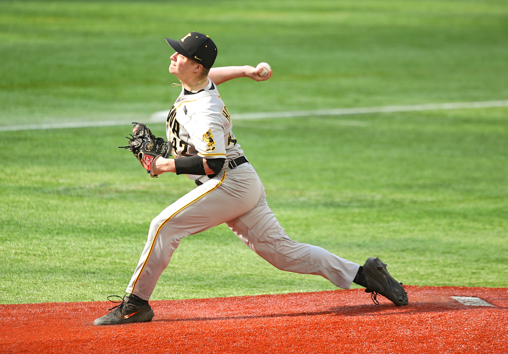 Iowa Hawkeyes pitcher Trace Hoffman (42) delivers to the plate during the third inning of their CambriaCollegeClassic game at U.S. Bank Stadium in Minneapolis, Minn. on Friday, February 28, 2020. (Stephen Mally/hawkeyesports.com)