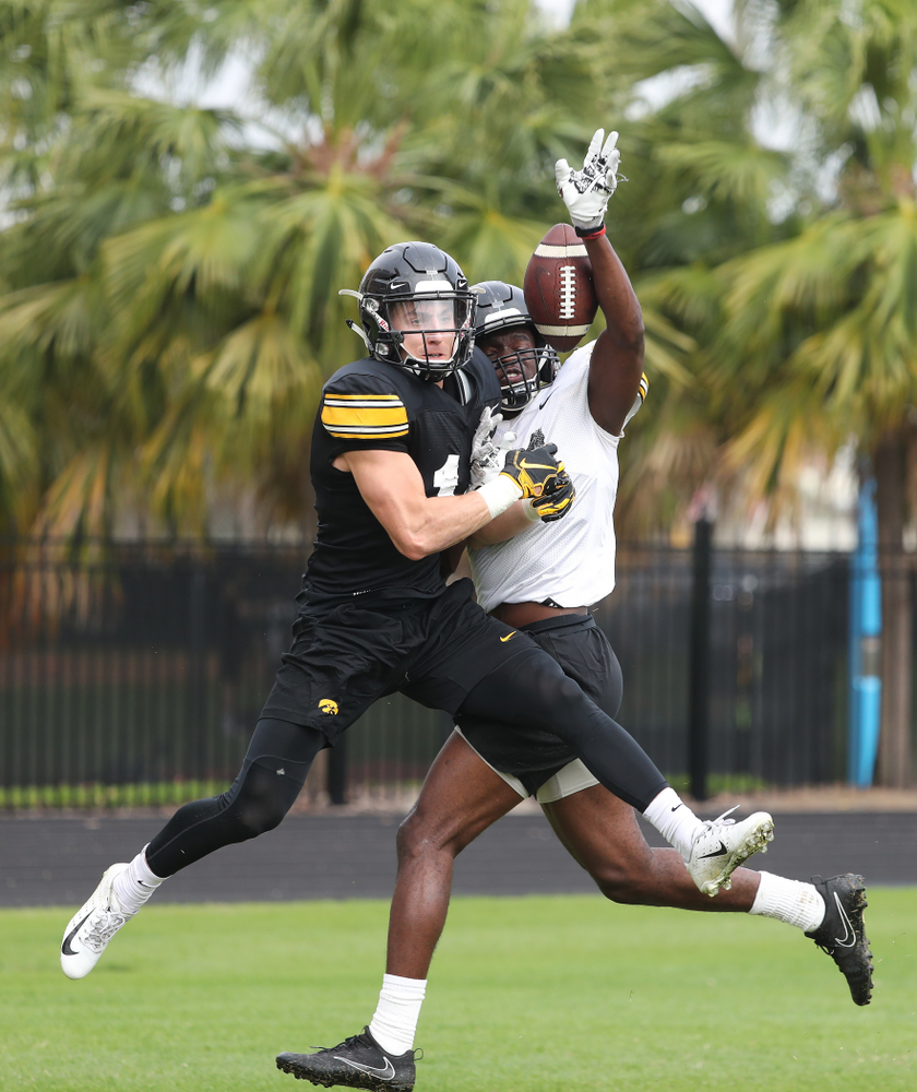 Iowa Hawkeyes defensive back Michael Ojemudia (11) and wide receiver Kyle Groeneweg (14) as the team prepares for the Outback Bowl Saturday, December 29, 2018 at Tampa University. (Brian Ray/hawkeyesports.com)