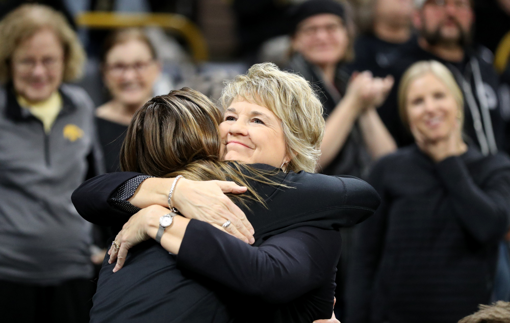 Iowa Hawkeyes head coach Lisa Bluder hugs former player Hannah Stewart before their game against Clemson Wednesday, December 4, 2019 at Carver-Hawkeye Arena. (Brian Ray/hawkeyesports.com)