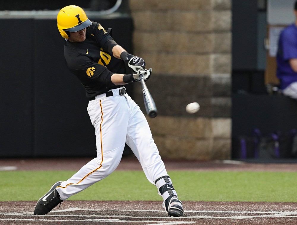 Iowa Hawkeyes shortstop Tanner Wetrich (16) gets a hit and two runs score after an error during the fourth inning of their game against Western Illinois at Duane Banks Field in Iowa City on Wednesday, May. 1, 2019. (Stephen Mally/hawkeyesports.com)