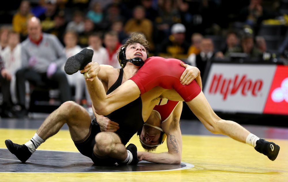 IowaÕs Austin DeSanto wrestles WisconsinÕs Seth Gross at 133 pounds Sunday, December 1, 2019 at Carver-Hawkeye Arena. DeSanto won the match 6-2. (Brian Ray/hawkeyesports.com)