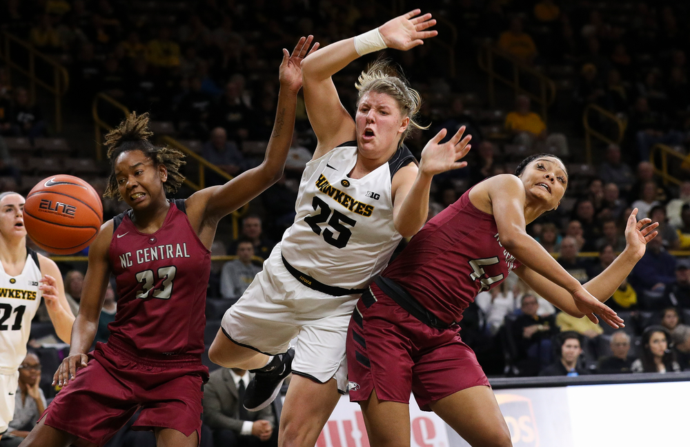 Iowa Hawkeyes forward Monika Czinano (25) is fouled in the act of shooting during a game against North Carolina Central at Carver-Hawkeye Arena on November 17, 2018. (Tork Mason/hawkeyesports.com)
