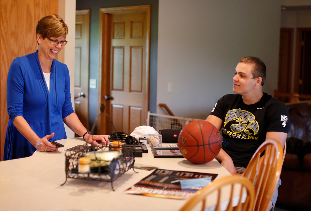 Iowa Hawkeyes quarterback Nathan Stanley (4) talks about some of his childhood memories with his mother Donita Wednesday, May 30, 2018 in Menomonie, Wisc. (Brian Ray/hawkeyesports.com)