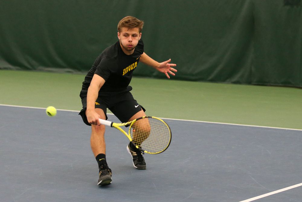 Iowa’s Will Davies returns a ball during the Iowa men’s tennis meet vs VCU on Saturday, February 29, 2020 at the Hawkeye Tennis and Recreation Complex. (Lily Smith/hawkeyesports.com)
