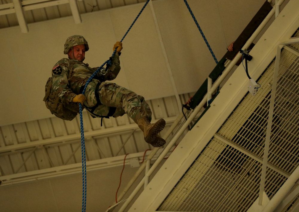 Members of the Iowa Army and Air Force ROTC rappel down from the rafters before the Iowa Hawkeyes game against Penn State Saturday, February 29, 2020 at Carver-Hawkeye Arena. (Brian Ray/hawkeyesports.com)