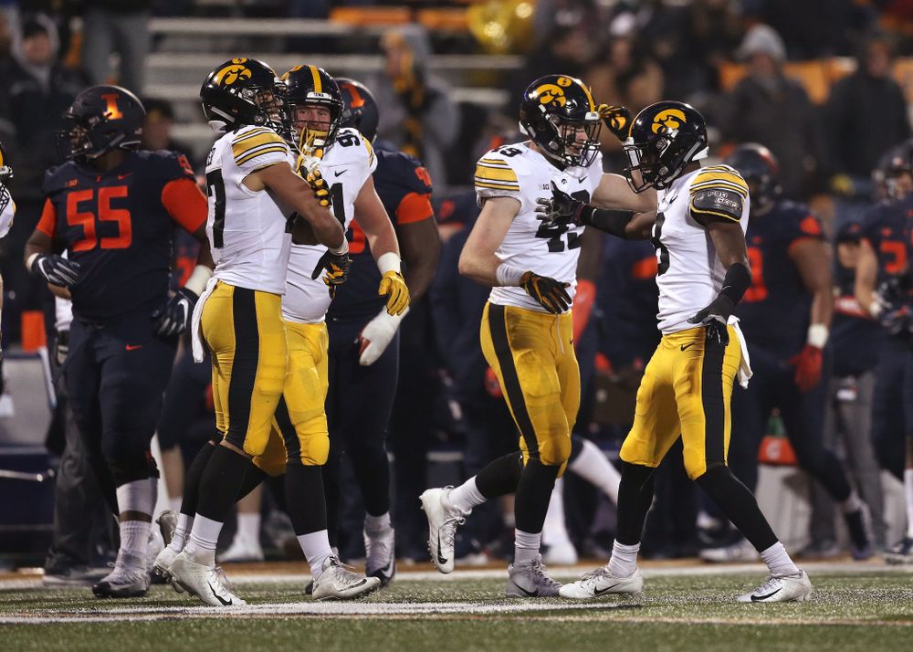 Iowa Hawkeyes defensive back Amani Hooker (27) intercepts a pass against the Illinois Fighting Illini Saturday, November 17, 2018 at Memorial Stadium in Champaign, Ill. (Brian Ray/hawkeyesports.com)