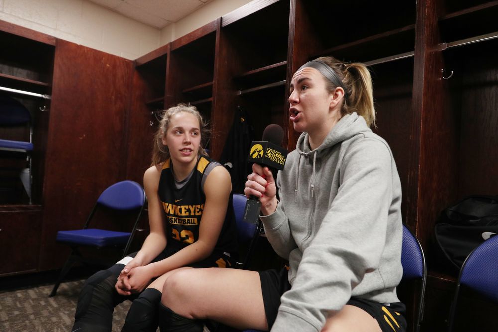 Iowa Hawkeyes forward Hannah Stewart (21) and guard Kathleen Doyle (22) during media and practice as they prepare for their Sweet 16 matchup against NC State Friday, March 29, 2019 at the Greensboro Coliseum in Greensboro, NC.(Brian Ray/hawkeyesports.com)