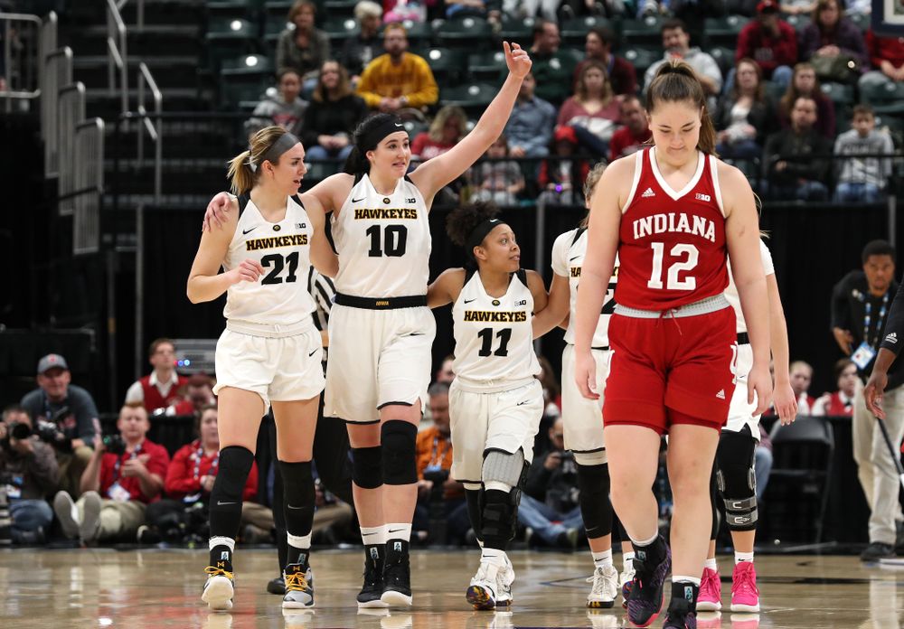 Iowa Hawkeyes forward Hannah Stewart (21), forward Megan Gustafson (10), and guard Tania Davis (11) against the Indiana Hoosiers in the quarterfinals of the Big Ten Tournament Friday, March 8, 2019 at Bankers Life Fieldhouse in Indianapolis, Ind. (Brian Ray/hawkeyesports.com)