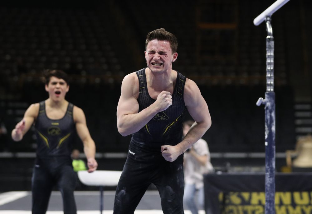 Iowa's Jake Brodarzon competes on the parallel bars against the Ohio State Buckeyes Saturday, March 16, 2019 at Carver-Hawkeye Arena. (Brian Ray/hawkeyesports.com)