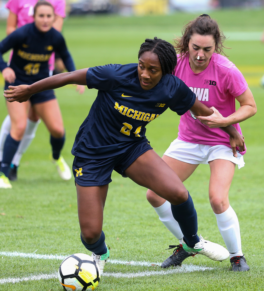 Iowa Hawkeyes forward Devin Burns (30) makes a tackle during a game against Michigan at the Iowa Soccer Complex on October 14, 2018. (Tork Mason/hawkeyesports.com)