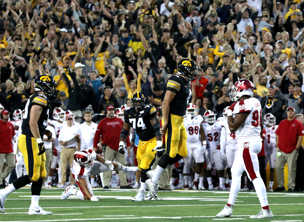 Iowa Hawkeyes quarterback Nate Stanley (4) celebrates a touchdown against the Miami RedHawks Saturday, August 31, 2019 at Kinnick Stadium in Iowa City. (Brian Ray/hawkeyesports.com)