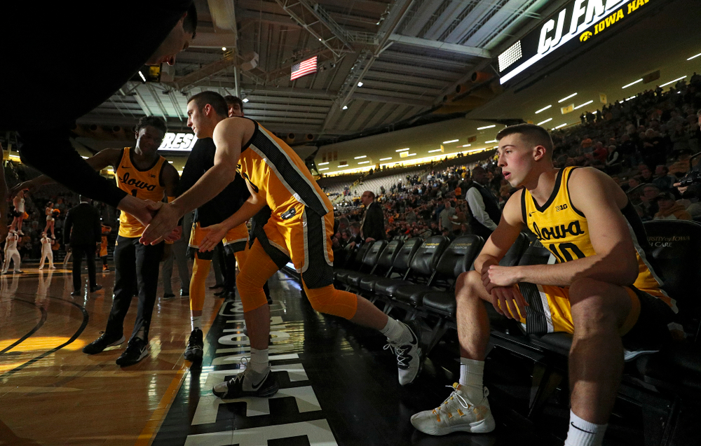 Iowa Hawkeyes guard Connor McCaffery (30) is introduced while guard Joe Wieskamp (10) waits before their game at Carver-Hawkeye Arena in Iowa City on Monday, Nov 11, 2019. (Stephen Mally/hawkeyesports.com)