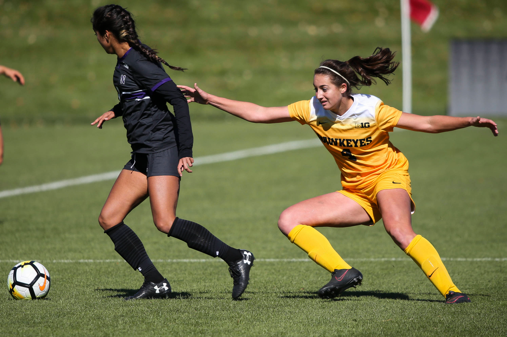 Iowa Hawkeyes forward Kaleigh Haus (4) defends during a game against Northwestern at the Iowa Soccer Complex on October 21, 2018. (Tork Mason/hawkeyesports.com)