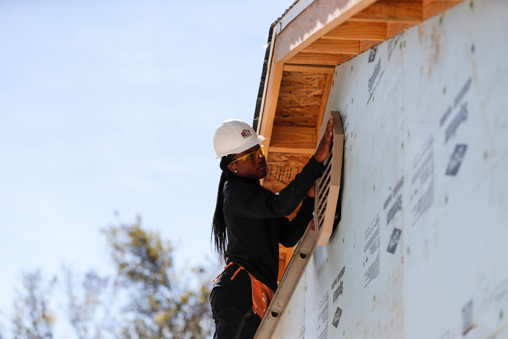 Iowa Hawkeyes guard Tomi Taiwo (1) works on the Habitat for Humanity Women's Build Wednesday, September 26, 2018 in Iowa City. (Brian Ray/hawkeyesports.com)