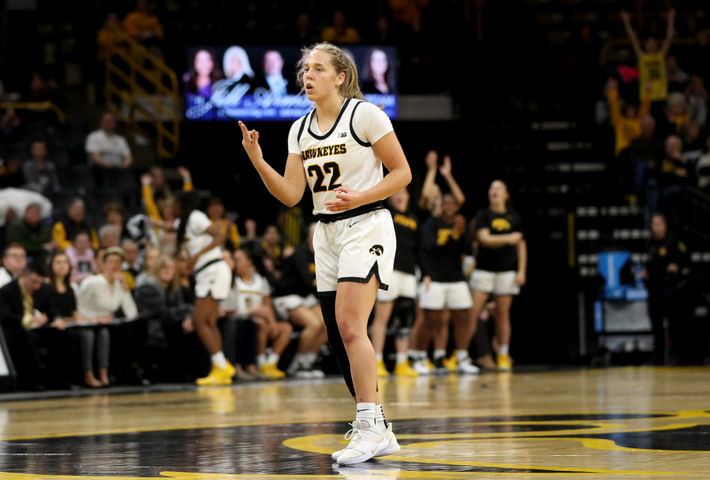 Iowa Hawkeyes guard Kathleen Doyle (22) knocks down a three point basket against North Carolina Central Saturday, December 14, 2019 at Carver-Hawkeye Arena. (Brian Ray/hawkeyesports.com)