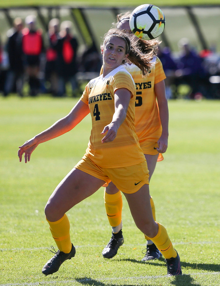 Iowa Hawkeyes forward Kaleigh Haus (4) heads the ball during a game against Northwestern at the Iowa Soccer Complex on October 21, 2018. (Tork Mason/hawkeyesports.com)