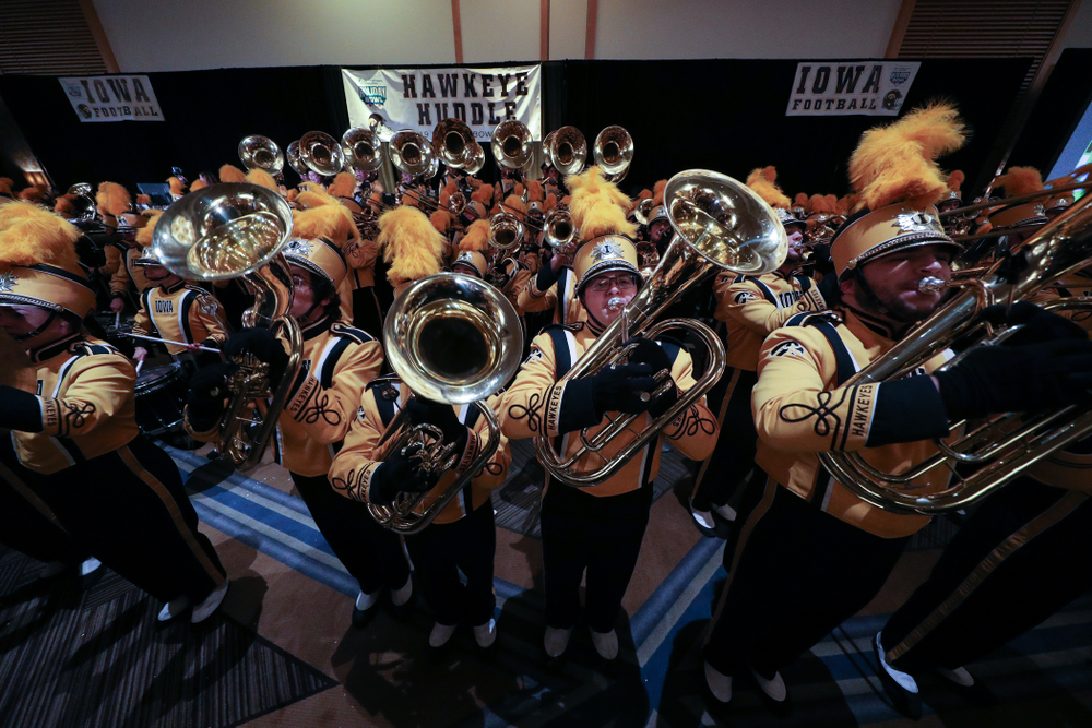 The Hawkeye Marching Band and the Iowa Spirit Squads perform during the Holiday Bowl Hawkeye Huddle Thursday, December 26, 2019 at the Hilton in downtown San Diego. (Brian Ray/hawkeyesports.com)