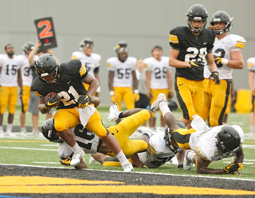 Iowa Hawkeyes running back Ivory Kelly-Martin (21) powers his way into the end zone durning Fall Camp Practice No. 17 at the Hansen Football Performance Center in Iowa City on Wednesday, Aug 21, 2019. (Stephen Mally/hawkeyesports.com)