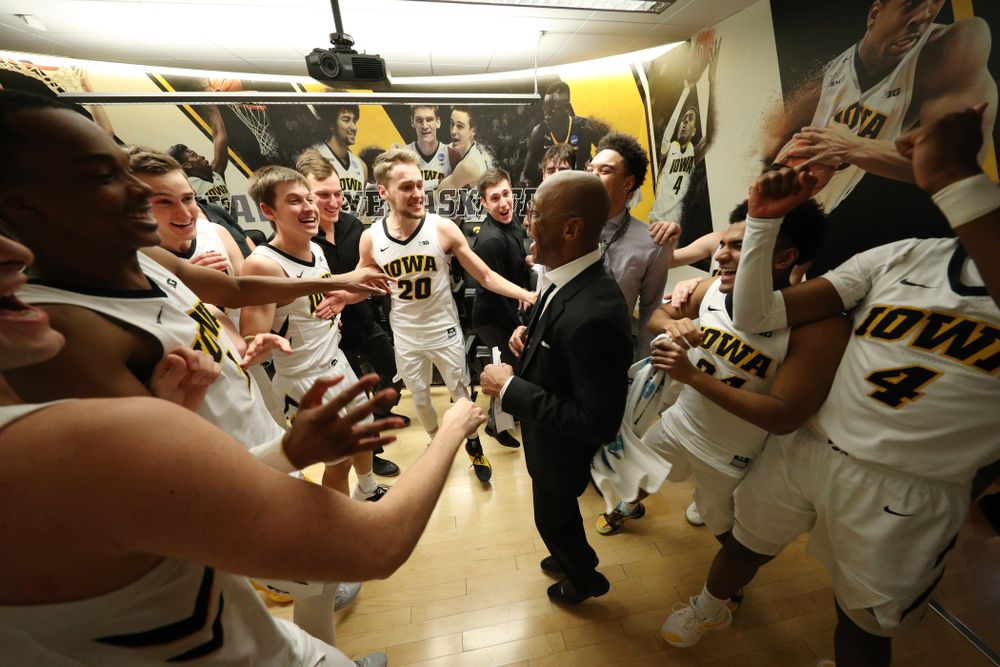 Iowa Hawkeyes assistant coach Sherman Dillard dances in the locker room following their victory over the Michigan Wolverines Friday, February 1, 2019 at Carver-Hawkeye Arena. (Brian Ray/hawkeyesports.com)