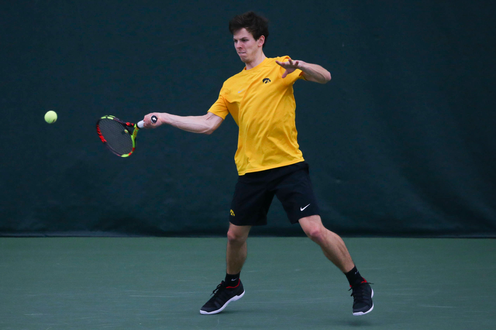Iowa's Joe Tyler at a tennis match vs Drake Friday, March 8, 2019 at the Hawkeye Tennis and Recreation Complex. (Lily Smith/hawkeyesports.com)